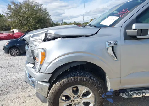 2022 Ford F-150 Lariat z USA, uszkodzony, nr VIN 1FTFW1E51NFA03366